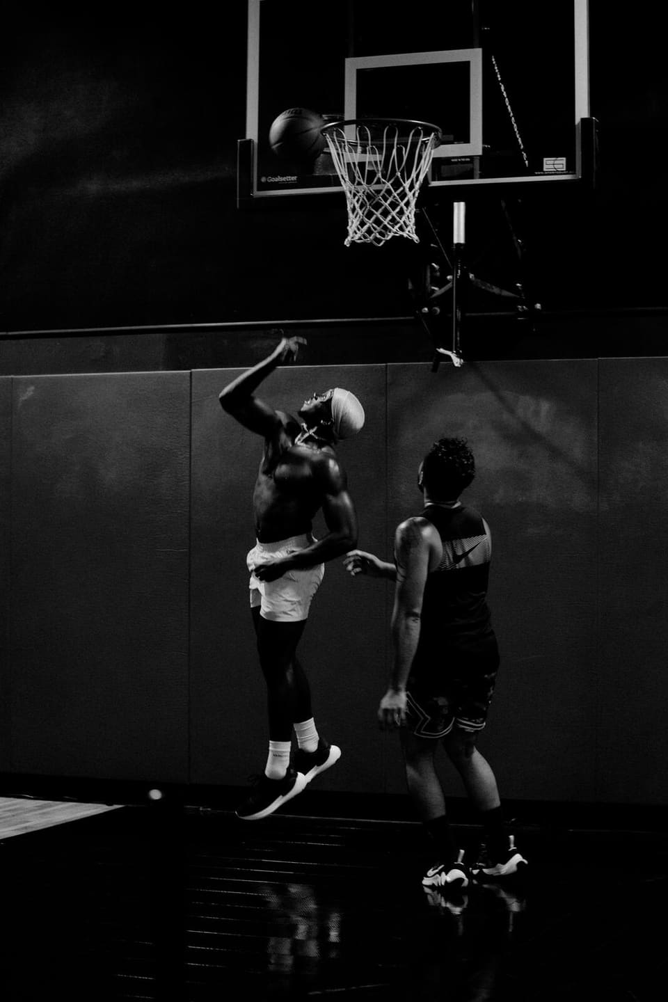 Athletes practising on a basketball court